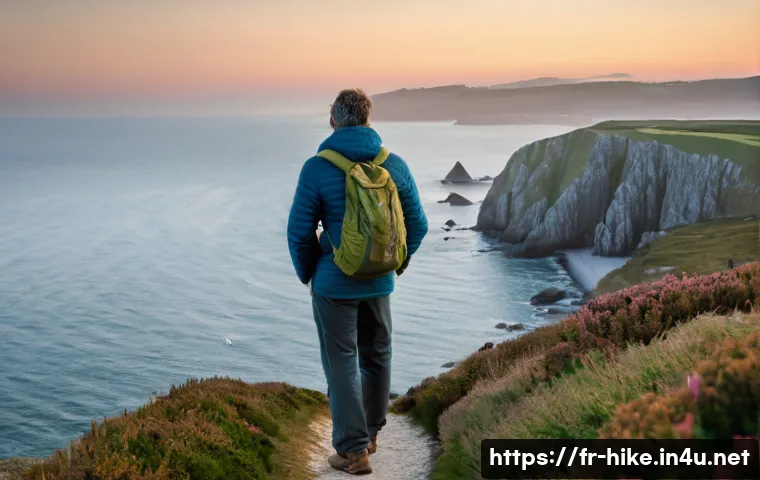 등산과 명상 결합법 - **Prompt:** A serene, adult hiker stands on a scenic coastal path in Brittany, France, during the ea...